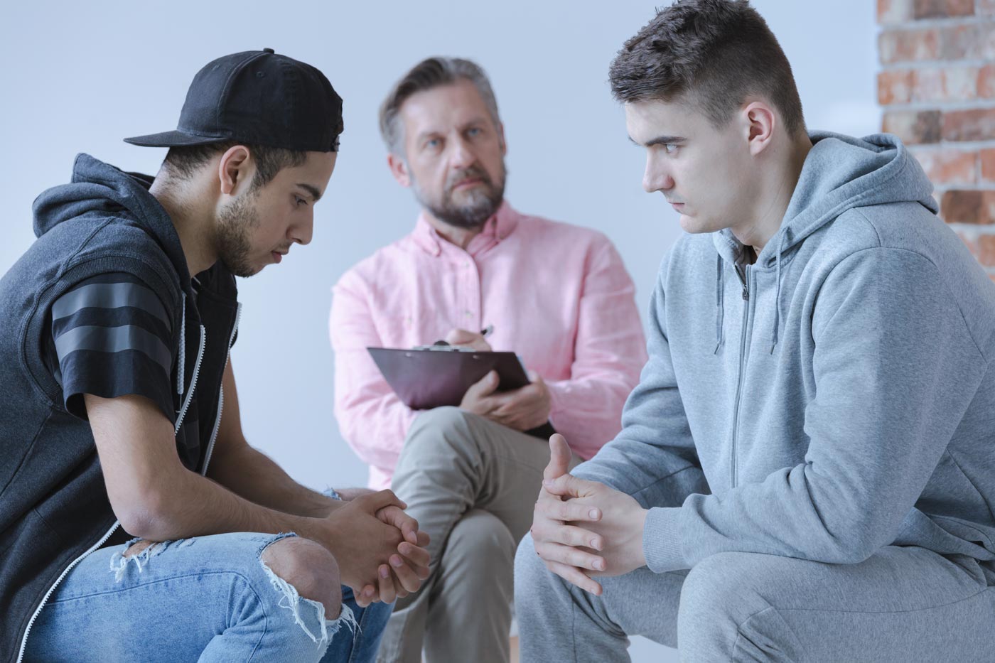 beginningstreatment-Fentanyl-addiction-photo-of-two-young-man-during-an-addiction-treatment-with-the-psychologist.jpg
