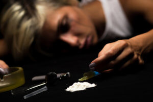 beginnings-treatment-centers-cocaine-overdose-article-image-of-girl-overdosing-387797170