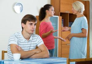 beginningstreatment-6-common-family-roles-in-an-addicted-household-article-photo-young-man-suffering-of-domestic-fight-between-family-members-426476074