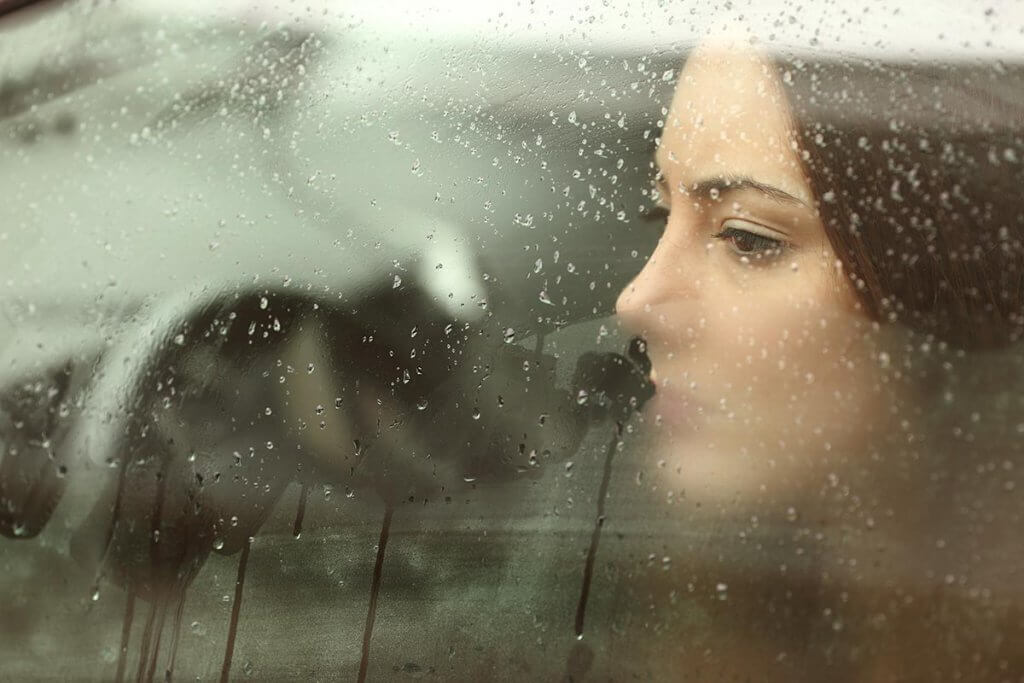 beginningstreatment-emotional-sobriety-do-i-have-it-article-photo-sad-woman-or-teenager-girl-looking-through-a-steamy-car-window-270757580