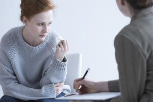 beginningstreatment-7-steps-to-take-after-finding-your-kids-drug-stash-article-photo-young-woman-suffering-after-her-relative-loss-637036855