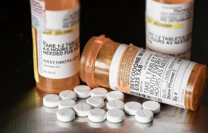 beginningstreatment-what-is-oxycontin-article-photo-oxycodone-is-the-generic-name-for-a-range-of-opoid-pain-killing-tablets-prescription-bottle-for-562612936