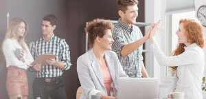 beginningstreatment-careersinaddictiontreatment-photo-people-working-in-positive-environment-woman-using-laptop-540369958