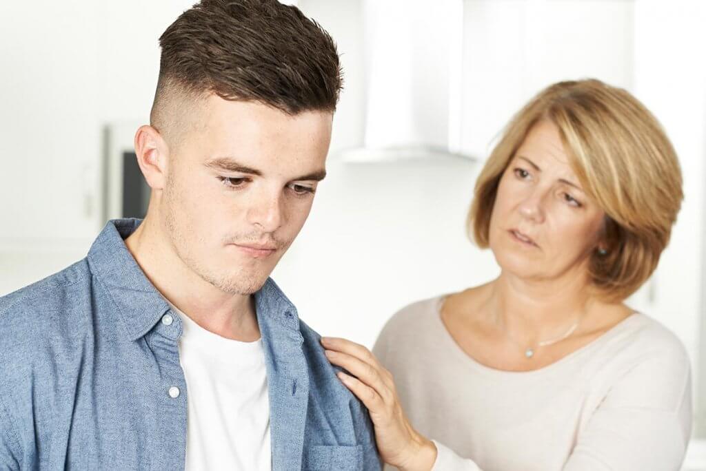beginningstreatment-how-to-say-no-to-an-addict-you-love-photo-mother-worried-about-unhappy-teenage-son-531839713