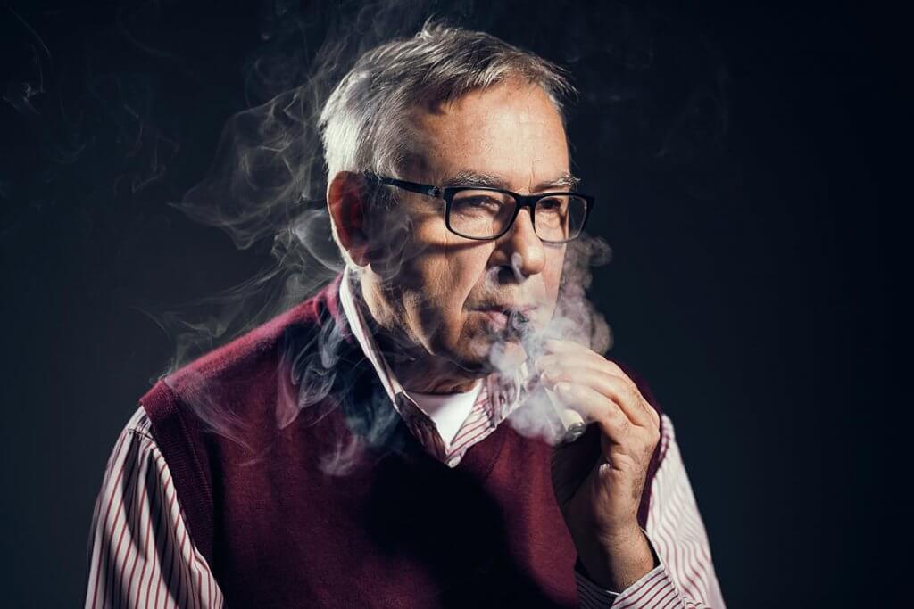 beginningstreatment-substance-abuse-in-aging-populations-article-photo-of-senior-man-who-is-smoking-a-heroin-787049194