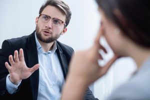 southcoastcounseling-What-is-SMART-Recovery-photo-of-portrait-young-businessman-talking-to-his-employee