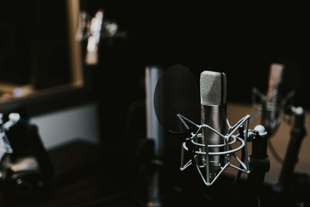 beginningstreatment-The-Best-Addiction-Recovery-Podcasts-photo-of-a-Condenser-microphone-in-a-studio