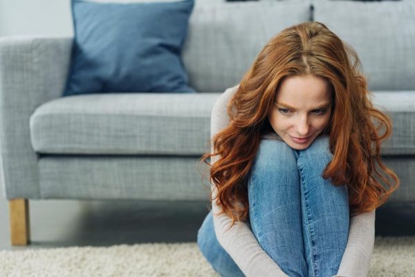 Woman sitting on the ground