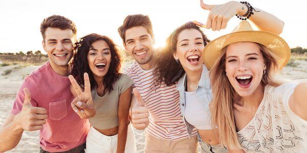 Group photo of people on the beach