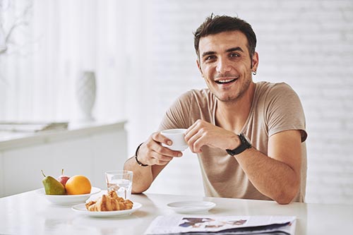 Man eating breakfast