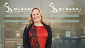Camile standing in front of Beginnings Treatment Center